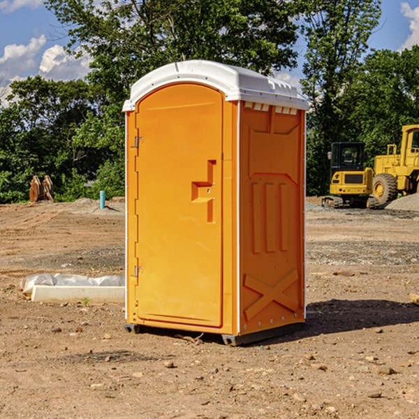 how often are the portable restrooms cleaned and serviced during a rental period in Bahama